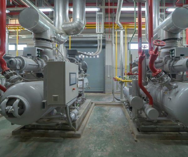 Industry factory. Cooling tower in building. System work machine. Water Supply and return pipe lines